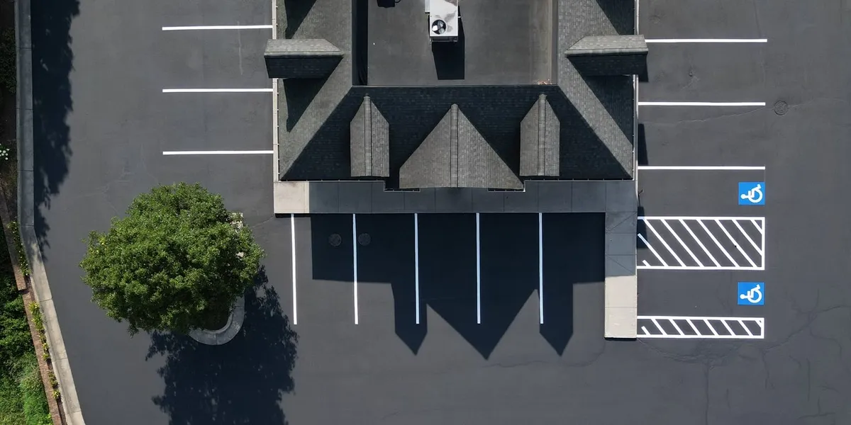 commercial-building-parking-lot-asphalt-sealcoating-finalized